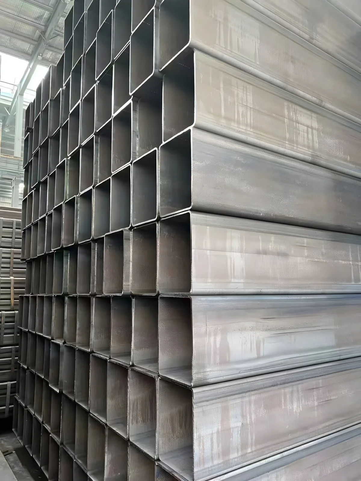 Close-up of large square tube ends showing wall thickness