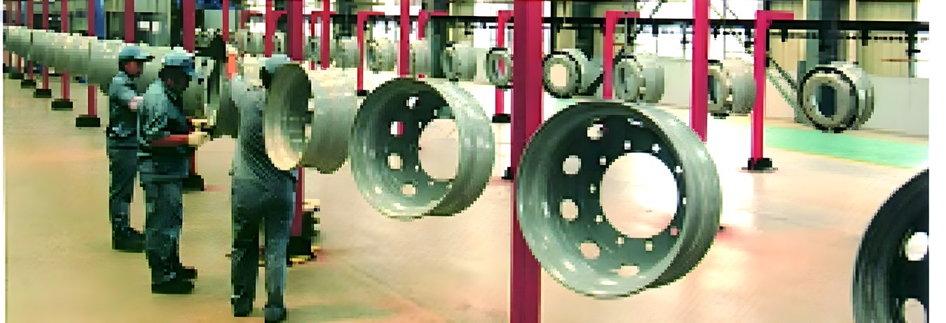 Truck wheels on the overhead conveyor at the wheel line