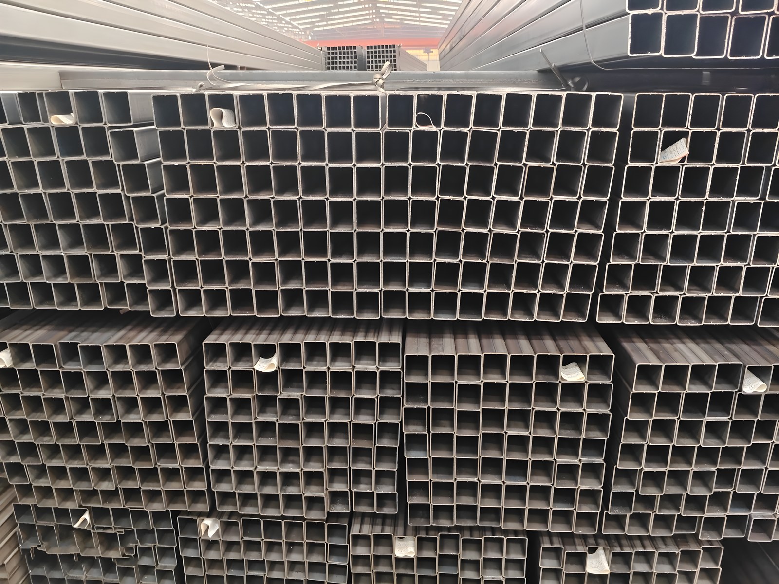 Bundled steel tubes loaded for dispatch
